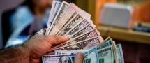 كم الفرق بين تصريف الدولار "الموازي"، و"الرسمي"؟