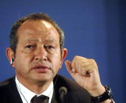 ساويرس يبدأ التفاوض لشراء جزيرتين يونانيتين لتوطين لاجئين من سوريا