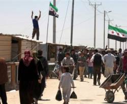 سوق الزعتري.. سوريون ينهشون لحوم بعضهم برعاية أردنية