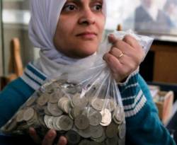 تكريساً للتضخم.. الليرة المعدنية خارج التداول في السوق السورية