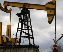 أسعار النفط تغلق على ارتفاع طفيف بعد جلسة متقلبة