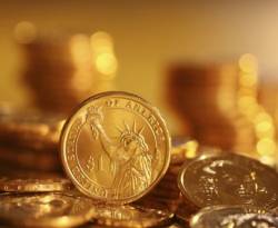 عالمياً: الذهب يصعد مع تراجع الدولار قبيل قرار المركزي الأمريكي
