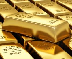 الذهب يتراجع مع صعود الدولار في نهاية ثاني أسبوع من الخسائر