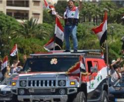 نظام الأسد يغني 