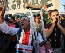 العبادي يقيل وزير الكهرباء بعد ثلاثة أسابيع من الاحتجاجات