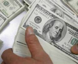 طلب كبير على الدولار في المناطق الخارجة عن سيطرة النظام