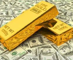 عالمياً: الذهب ينزل دون 1200 دولار والدولار يقلص خسائره بعد بيانات أمريكية مشجعة