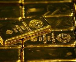 عالمياً: الذهب يتراجع بفعل قوة الدولار لكن أزمة إيطاليا تحد من الخسائر