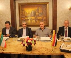 حيتان اقتصاد النظام على مائدة فهد درويش.. ومعهم السفير الإيراني