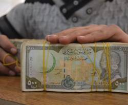 أنباء عن تحسن في سعر صرف الليرة السورية