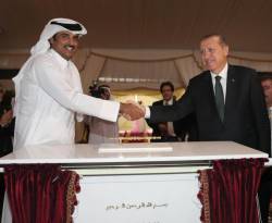 أردوغان يلوح لبوتين من الدوحة