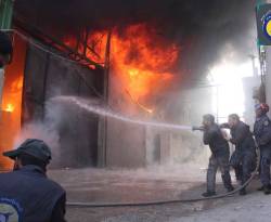 حريق ضخم في مستودع تجاري في مسرابا بالغوطة.. جراء اقتتال الفصائل