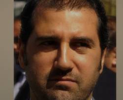 موقع موالٍ للنظام يلمح إلى صحة أخبار الإطاحة برامي مخلوف