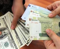 الريال الإيراني يهبط لمستوى قياسي عند 138 ألف ريال للدولار