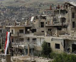 النظام يرد على المشككين بقدرته على إعادة الإعمار