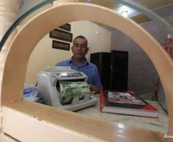 العراق ينهي السحب النقدي بالدولار في أول كانون الثاني 2024