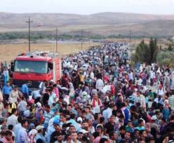 أعداد اللاجئين السوريين في شمال العراق تقترب من ربع مليون نسمة