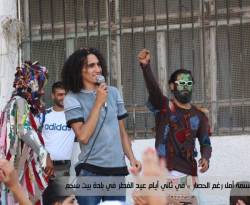 بالصور...فعالية احتفالية للترفيه عن أطفال بلدات جنوب دمشق المحاصرة