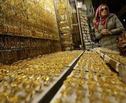 الذهب يرتفع عالمياً وينخفض في سوريا
