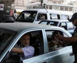 اقتصاديات.. اقتصاد الحواجز والمعتقلين ونهب ممتلكات السوريين