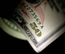 عالمياً: الدولار يرتفع صوب أعلى مستوى في 16 شهراً بعد تلميحات المركزي الأمريكي