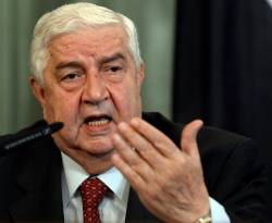 المعلم يقرّ بالتنافس بين الأكراد والنظام على مناطق النفط