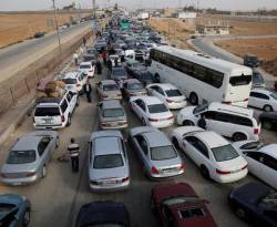 أردنيون يتدفقون على سوريا.. وتاجر يصف إقبالهم بـ 