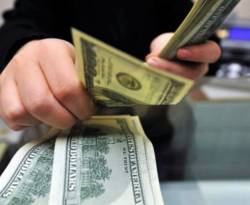 ما هي الأعمال التي يحق للتاجر أن يتعامل فيها بغير الليرة السورية..؟